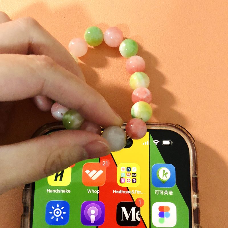 Side of the main bead held against the top of an iPhone, with no notification